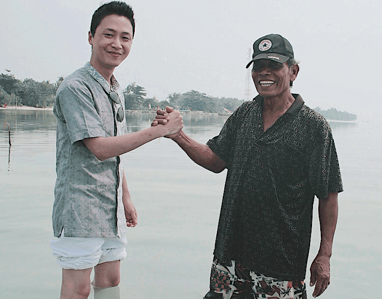 Evoware Founder & CEO with a local seaweed farmer in Indonesia. | Photo Courtesy: Evoware